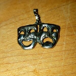 Sterling silver comedy and tragedy mask pendant